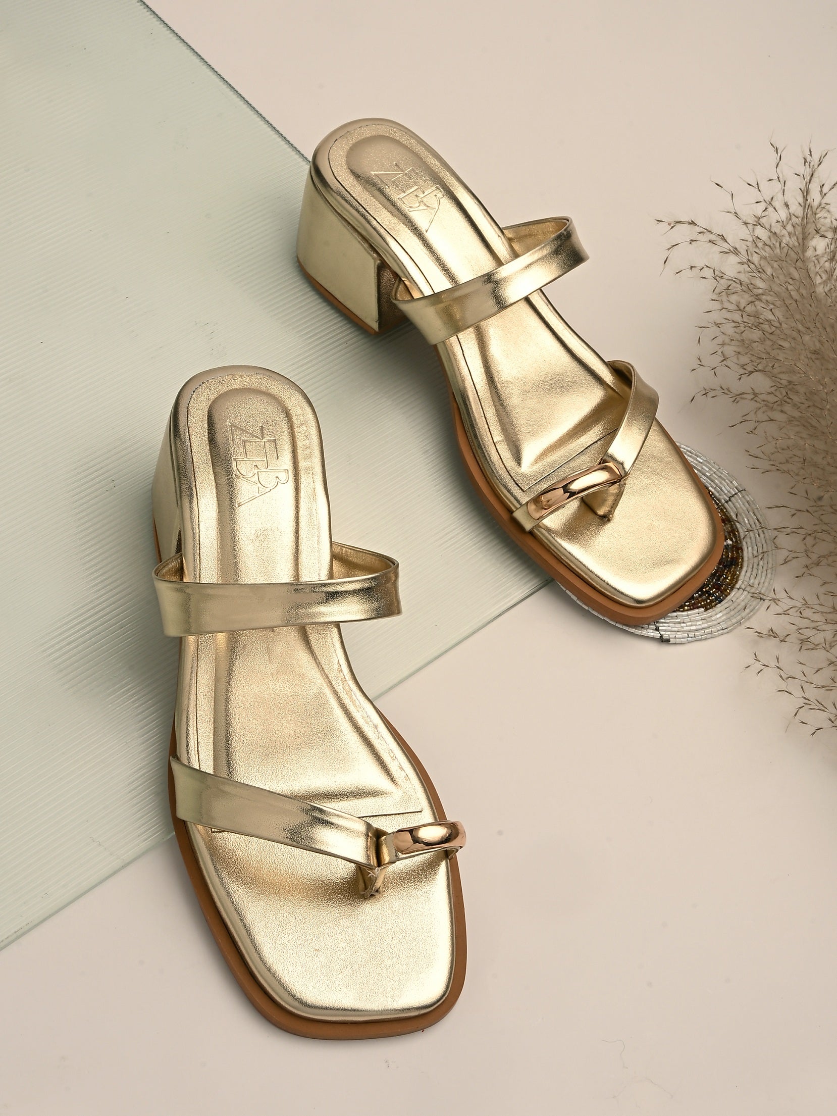 Vellora Toe ring Heels